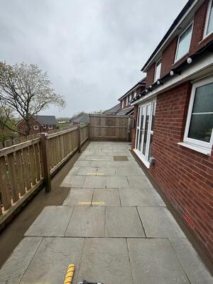 Concrete patio slabs prior to new resin surfacing being inastalled by RNM Resins in property in Loughor Swansea