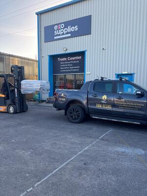 RNM Resins collecting materials from Exo Supplies for resin bound patio resurfacing project at Loughor Swansea