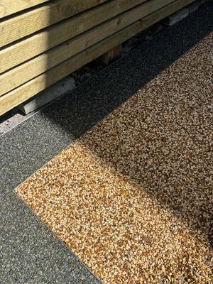 Close up shot of completed resin bound patio installation in Pontardawe Swansea by RNM resins