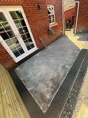 During Sage grey resin bound border being laid on patio at Pontardawe residents, Swansea by RNM Resins